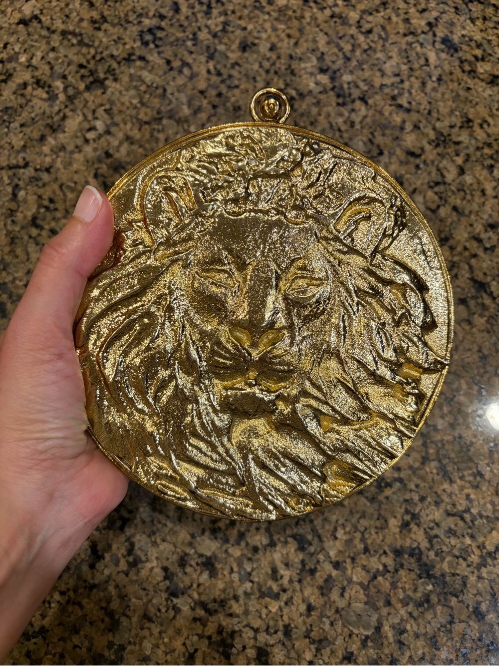 Round Gold Lion Relief Clutch